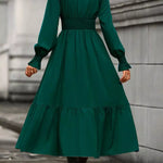 Elegant tiered long sleeve midi dress by Fashoner