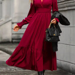 Long sleeve tiered polyester dress by Fashoner